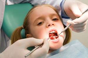 Лечение детских зубов